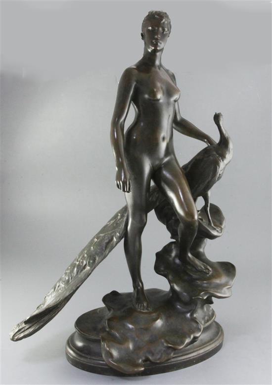 Alexander Falguiere. A bronze group of a nude woman standing beside a peacock, 29.5in.